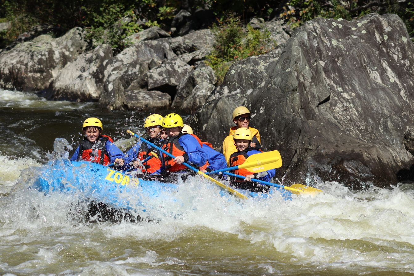 Fessenden students white water rafting togeteher