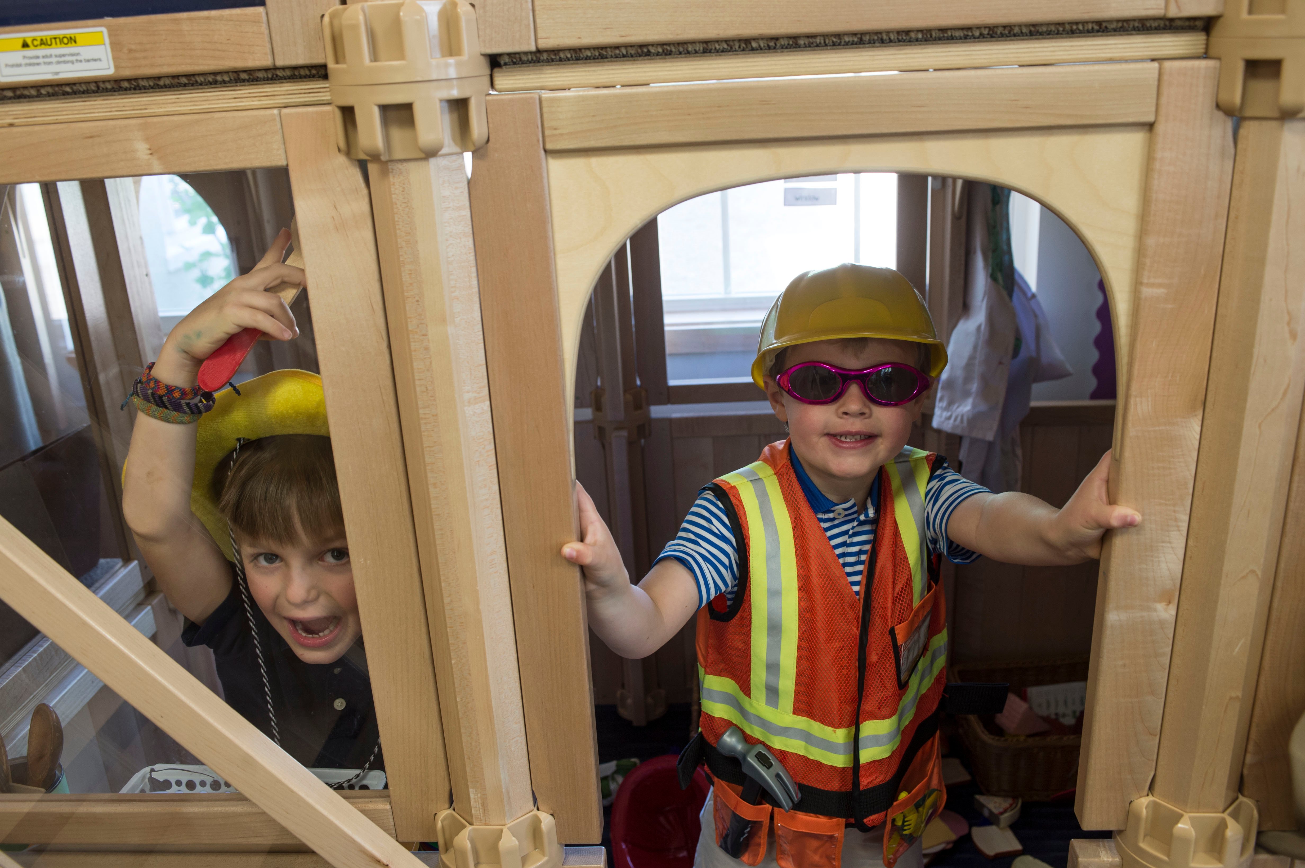 Two pre-k students at The Fessenden School playing during class.