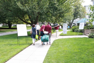 Boarding school students with their parents on move in day at Fessenden.